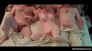 wife takes care of two cocks